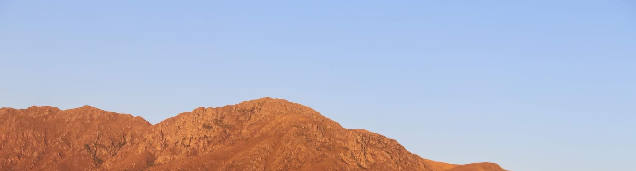 Cerro Uritorco, red in the early light